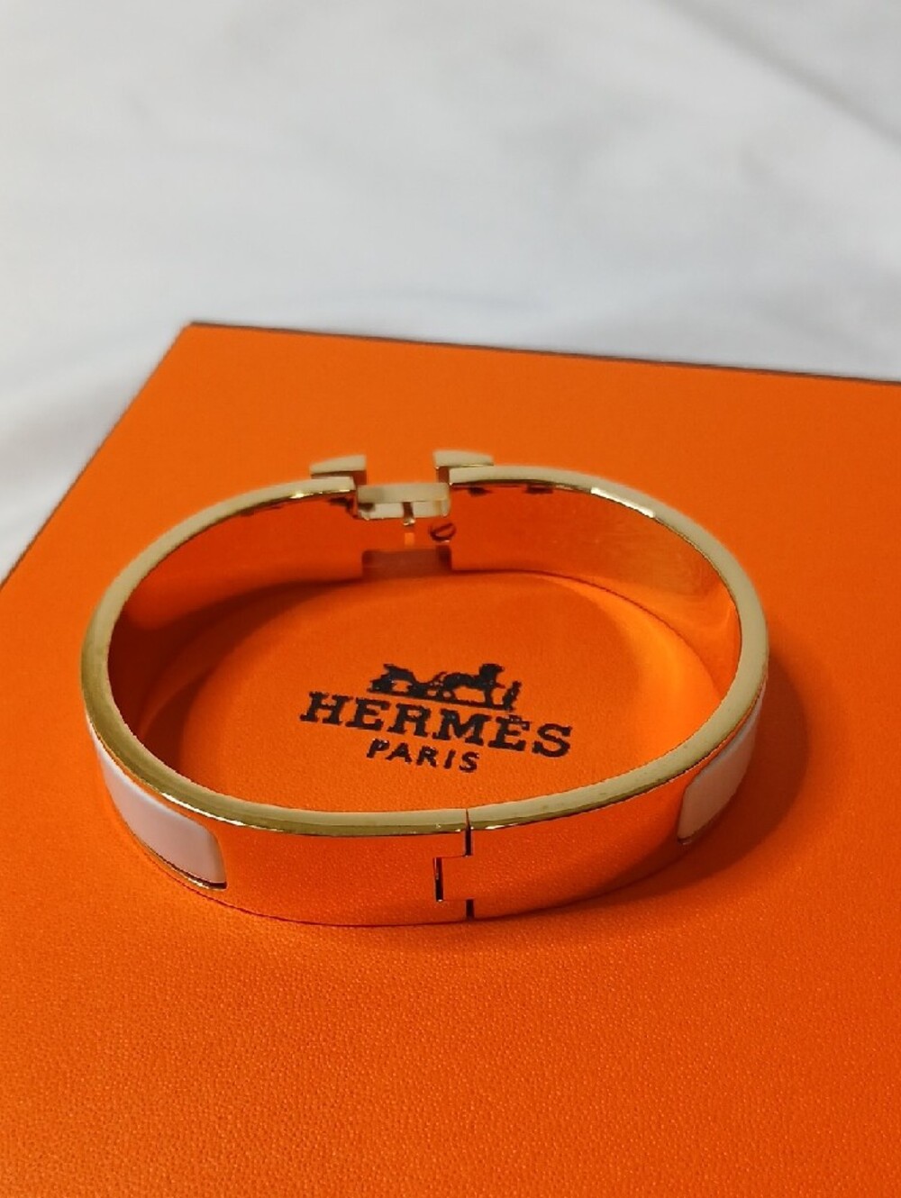 Hermes White Enamel and Gold H Clic Clac Bracelet - Picture 4 of 4